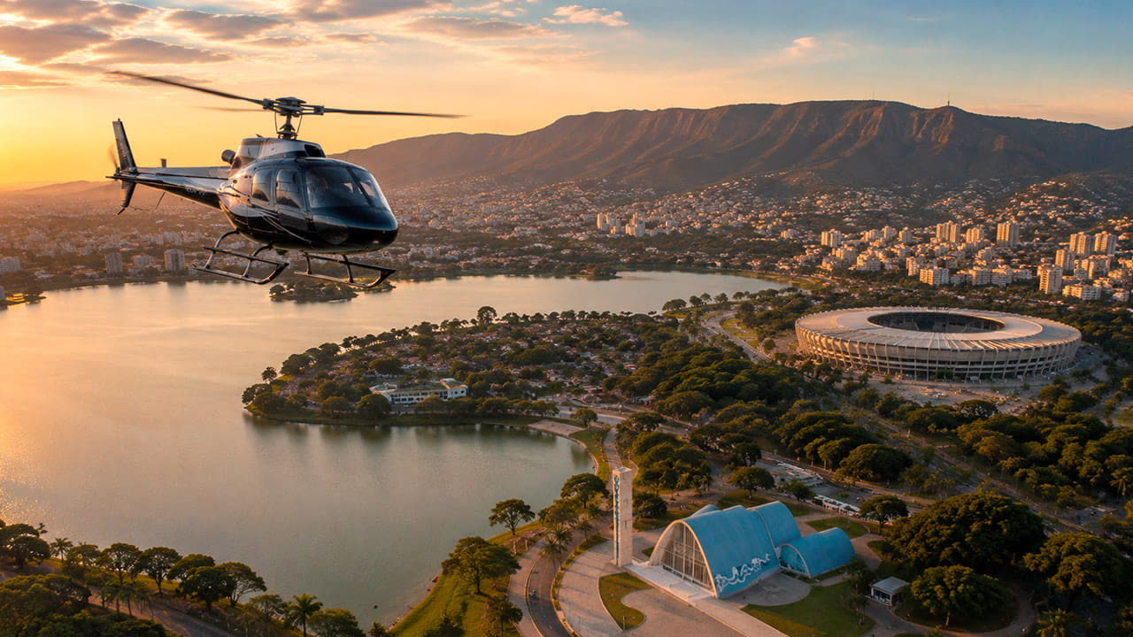 Passeio de helicóptero ao entardecer sobre a Pampulha, com o Mineirão e a Serra do Curral ao fundo